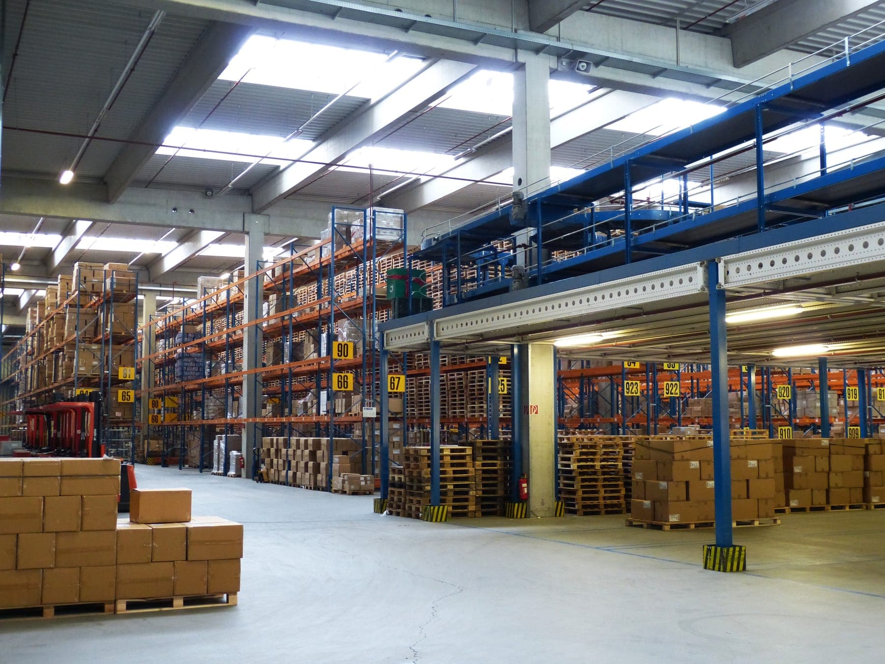 Warehouse with racks and pallets