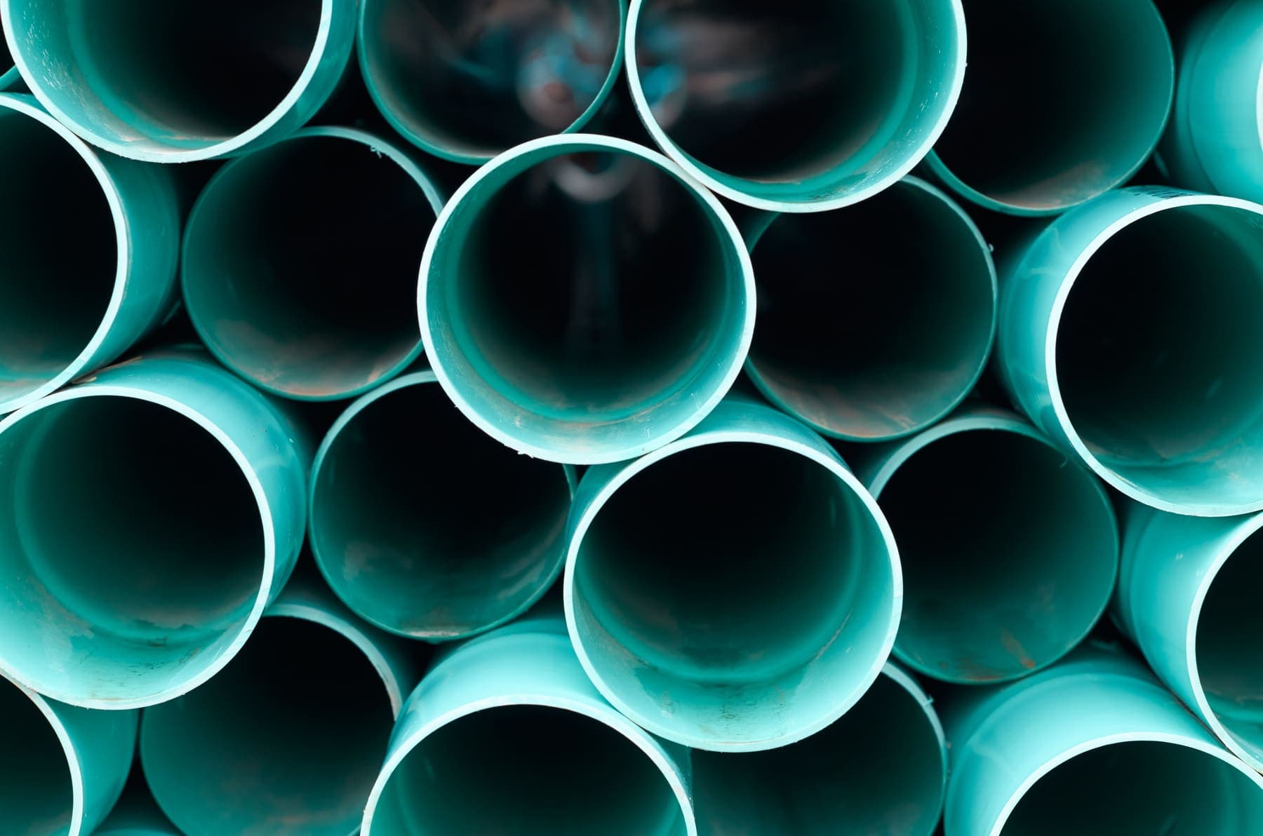 Extruded plastic pipes